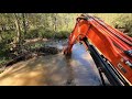 Ripping out a major beaver dam, watch the water flow