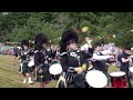 Scotland the Brave as Drum Majors salute Chieftain at opening of 2024 Drumtochty Highland Games