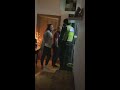 Police forcefully enter house and arrest a woman who hasn't committed a crime.