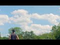 young man runs outdoor in slow motion man running on background of sky handsome male runner training