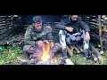 BUSHCRAFT OVERNIGHT IN NATURAL SHELTER - Cooking meat on stone. Ak7 the wolf