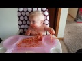Baby miles eating spaghetti