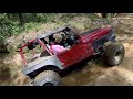 Jeep offroading, 4x4, trail-riding in some off-camber Florida hills.