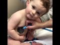 Sweet Baby Boy Rests Head On Nurse's Hand