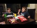 Kids try very spicy taco bell chips.