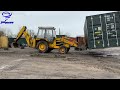 Can a JCB 3CX lift and move a 20ft shipping container?