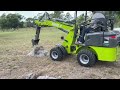 Excavator/digger attachment on an electric loader (NESHER L1400)