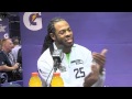 Richard Sherman gets into a debate with a reporter