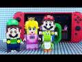 Lego Mario needs help! Luigi enters the Nintendo Switch to save Mario and Yoshi! #legomario
