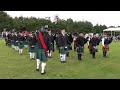 Scotland the Brave on the march by the Pipes and Drums at 2023 Stonehaven Highland Games in Scotland