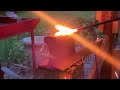 Hammering steel with a treadle hammer.