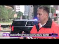 Isiah talks to HFD Chief Sam Pena about storm destruction in downtown Houston