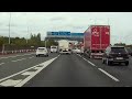 Mercedes nearly gets flattened by truck