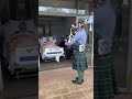 A bagpipe visit for Kenny at St Michael's Hospice Hereford