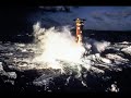 Lighthouse in a storm. The Wolf Rock. mid 1990's