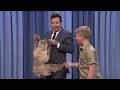 Robert Irwin and Jimmy Cuddle a Sloth