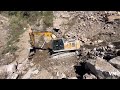 landslide cleared by cat Hitachi exacavator1713100147578182