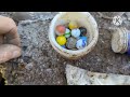 Town dump artifacts. Antique bottles, marbles, toys and a NY Militia button.