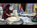 Ayesha and Fatimah help the Peren family by baking bread for them