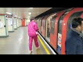 Rush hour Mile End London Underground trains, Central Line, westbound