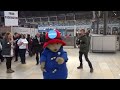 Paddington Bear gives free hugs at Paddington Station