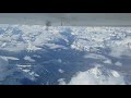 Air Canada Q400 flying over Canadian Rocky Mountains
