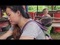 A 17-year-old single mother washes clothes and cooks with her children.