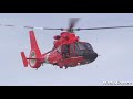 USCG HH-65 Dolphin Helicopter In South Beach Rescue Drill