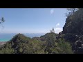 Climbing down Hahaione Pyramid. Oahu.