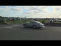 Aston Martin DB5 driving off