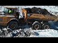 Volvo Rock Truck pulled out with 2 Dozers and an Excavator