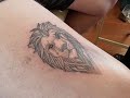 Micro geometric lion tattoo