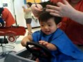 More of Robbie's first haircut at Cool Cuts.