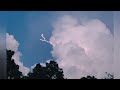 Insane lightning in daylight - with slow motion sun out cloud to cloud lightning