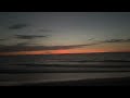 Sunset on the beach, sound of waves crashing