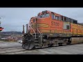 Trio of BNSF dash 9s lead CSX grain train