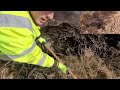 Unclogging Culverts Under Frozen Pond To Drain Flooded Road With Huge Powerful Whirlpools.