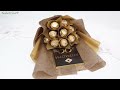 Handmade bouquet of ferrero rocher sweets and chocolate bar. Gift for man, woman