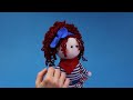 A funny doll out of socks with lovely curls - you won’t buy such a doll in the shop!