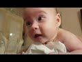 2 month old baby talking to dad