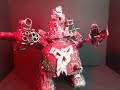 How to scratch build a Warhammer40k Ork Stompa out of trash.