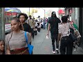 Summer weather arrived early in NYC, The Bronx on Fordham Road - april 29,2024