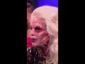 Katya booting Alaska's outfit