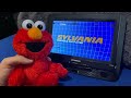 Elmo Watches The Nick Jr Frogs Logo