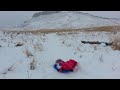 Wrenny sledding on North Table Mtn