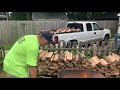 Wheelbarrowing/stacking Joe Cord firewood