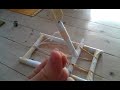 Paper catapult shooting orange seed