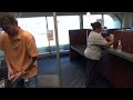 My mom catching dollars in the money machine at the bank