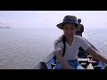 A local Thai girl shows real Thailand. The biggest lagoon lake of Thailand. Thale Noi. Phatthalung