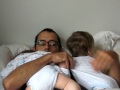 Daddy putting twins to sleep